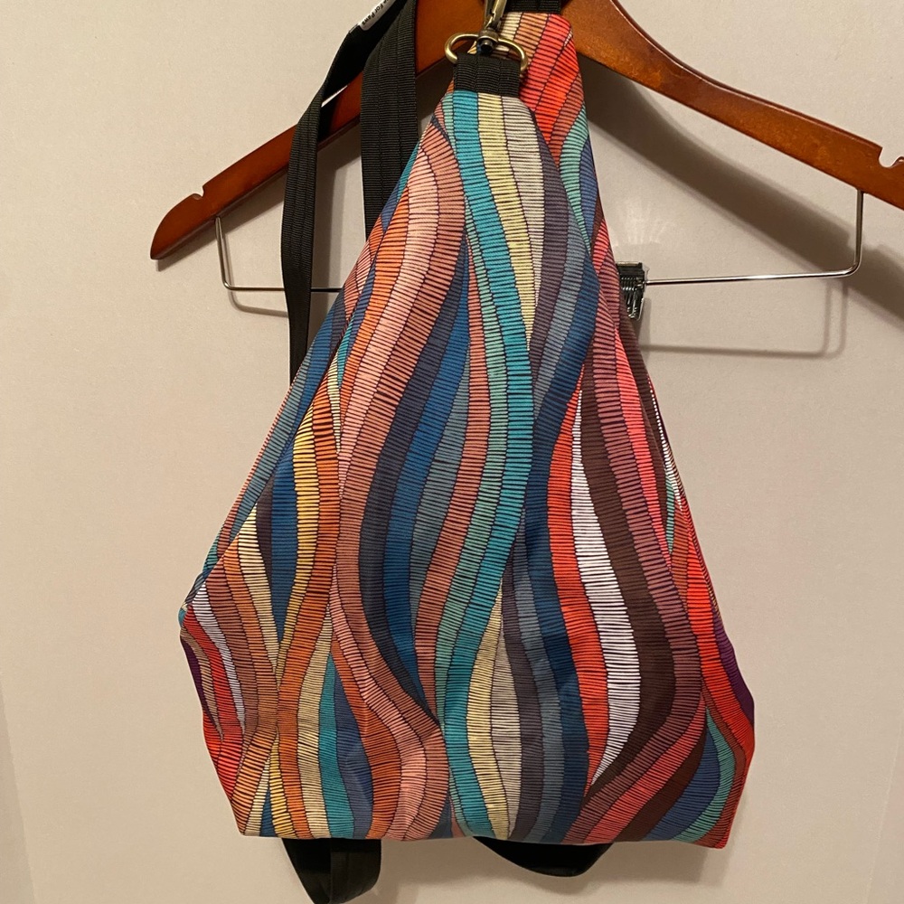 Bold Red and Orange Crossbody Bag with Sleek Design